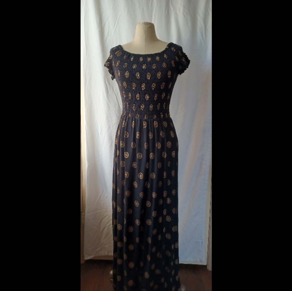 Cassee's long black and gold dress